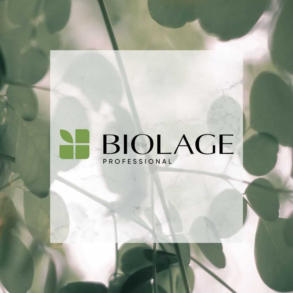Biolage Professional logo overlaid on a natural, leafy green background.